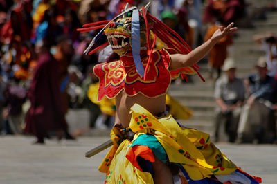 People in traditional clothing during festival