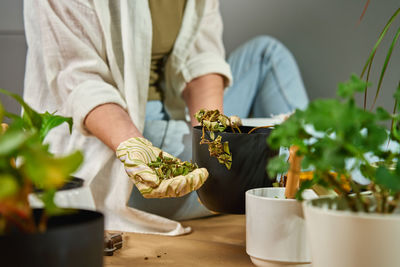 Midsection of woman having food