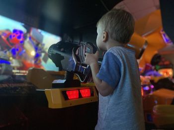 A boy is playing video games