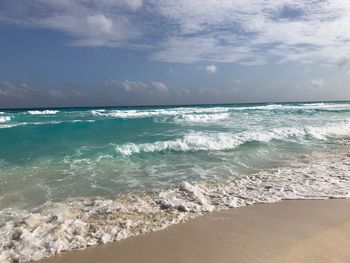 Scenic view of beach against sky