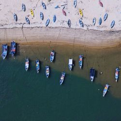 Aerial view of boats moored in sea
