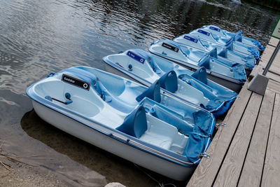 High angle view of boats moored at pier