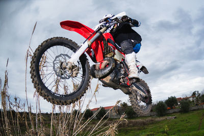 Low angle view of bicycle on field