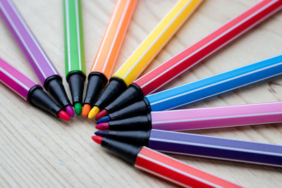 High angle view of multi colored pencils on table