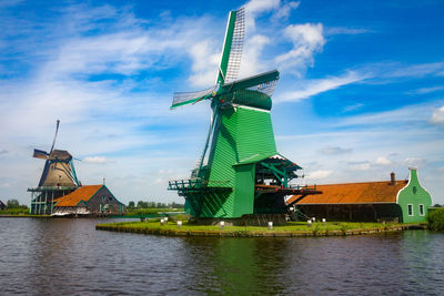 Traditional dutch windmills and cottages in zaanse schans, netherland