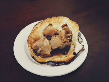 Close-up of bread in plate on table