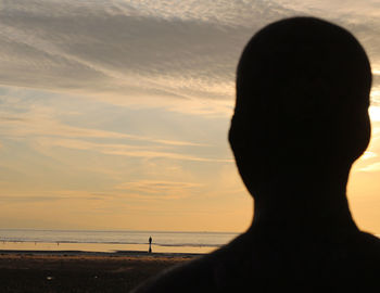 Scenic view of sea at sunset