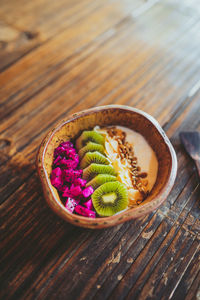 High angle view of fruits in bowl on table