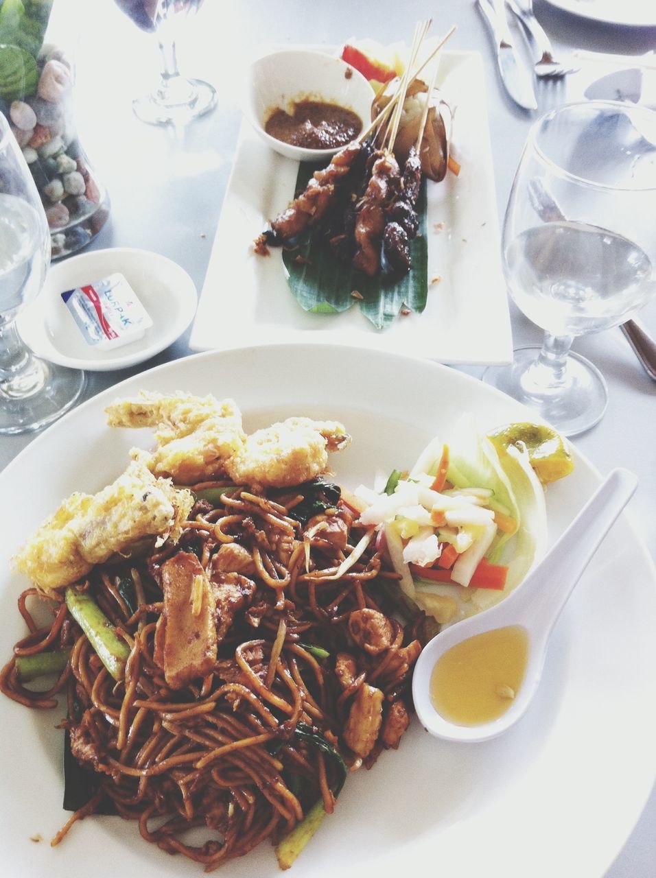 food and drink, food, indoors, plate, freshness, ready-to-eat, table, serving size, still life, healthy eating, meal, served, fork, high angle view, close-up, meat, bowl, seafood, spoon, drink