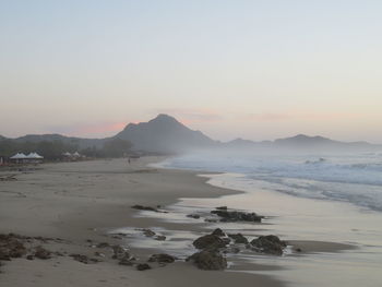 Scenic view of beach against sky