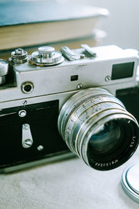 Close-up of camera on table