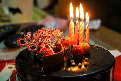 Close-up of candles on cake