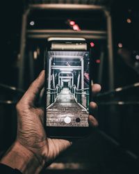 Close-up of hand holding smart phone