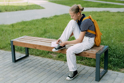 Side view of man using mobile phone