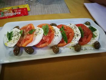 Close-up of served food in plate