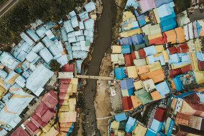 High angle view of multi colored umbrellas by building