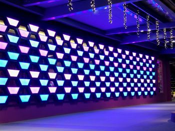 Low angle view of illuminated lights in building