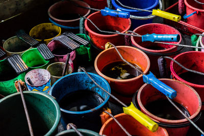 High angle view of colorful buckets