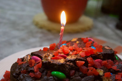 Close-up of candles on cake