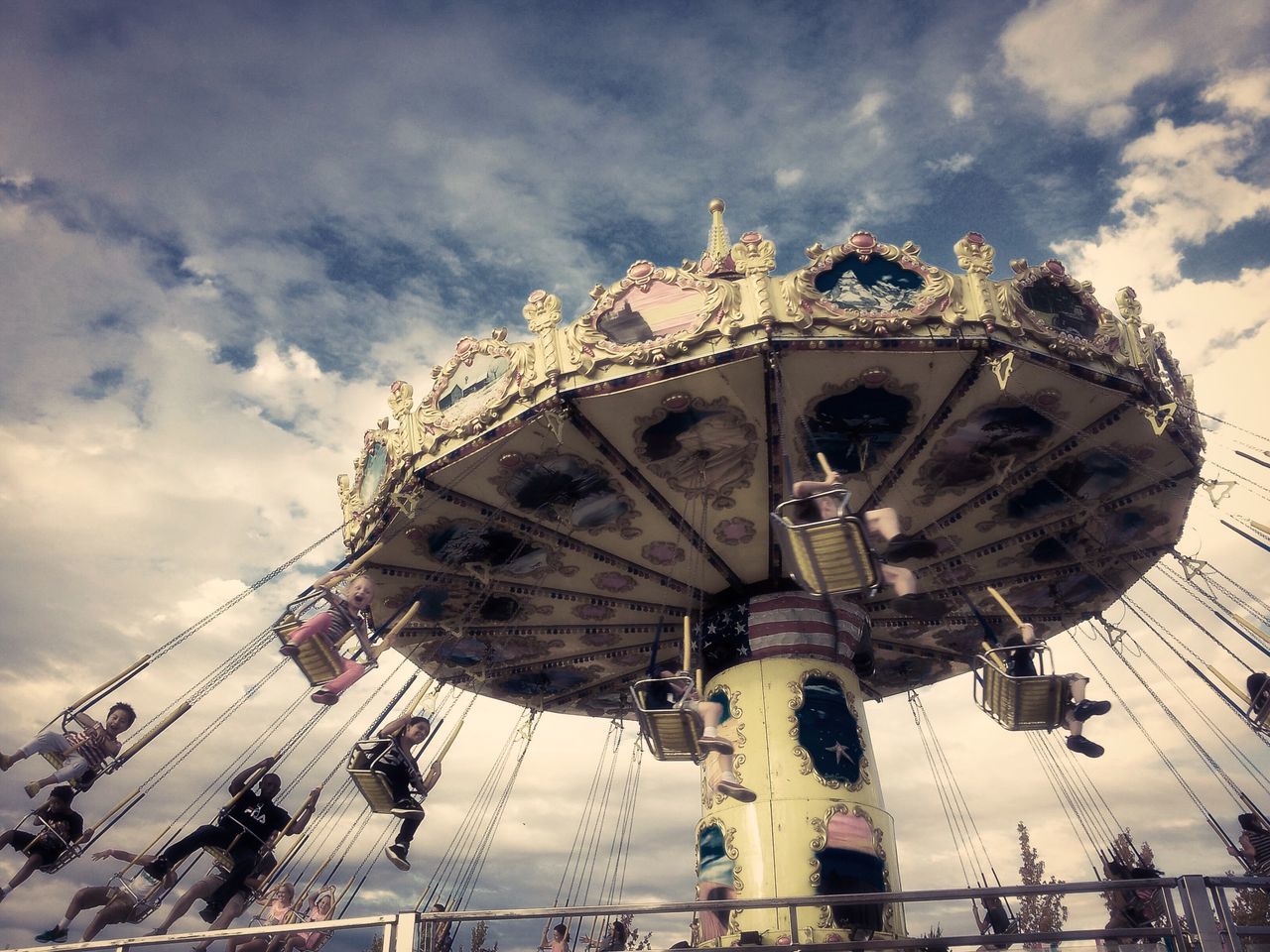 LOW ANGLE VIEW OF FERRIS WHEEL AGAINST SKY