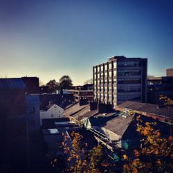 High angle view of buildings against clear sky