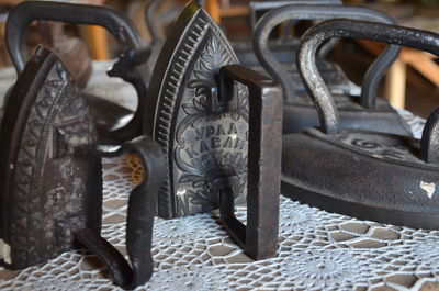 Close-up of padlocks on metal