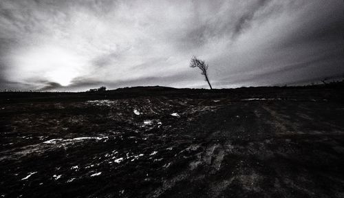 Scenic view of land against sky