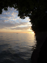 Scenic view of sea against sky at sunset