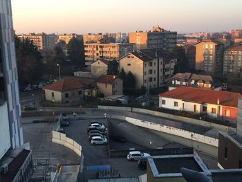 High angle view of buildings in city against sky