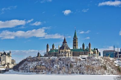 View of church in city during winter