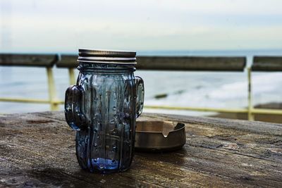 Close-up of glass jar on table