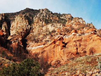 Scenic view of rocky mountains against sky