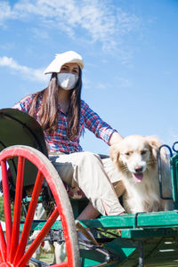 Traditional argentinian woman wearing face mask in festival