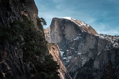 Panoramic view of rocky mountains against sky