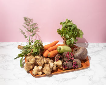 Organic fresh vegetables on a tray in the kitchen. healthy raw food concept