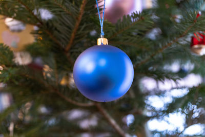 Close-up of christmas decoration hanging on tree