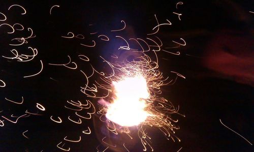 Low angle view of firework display