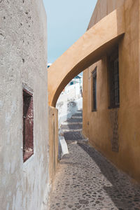 Alley amidst buildings in city