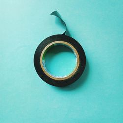 High angle view of blue container on table