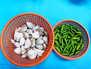 High angle view of vegetables in basket on table