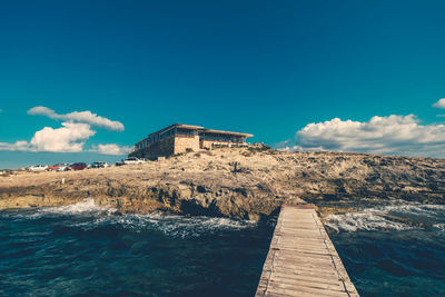 Restaurant at beach against sky at formentera island