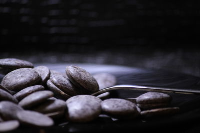 Close-up of coffee beans on table