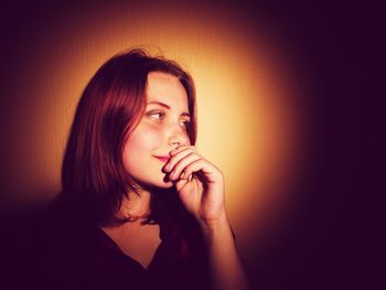 Portrait of young woman indoors