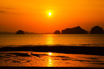 Sunset in krabi thailand gold and black tranquility 