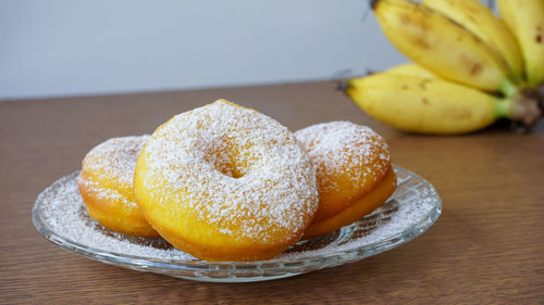 Close-up of fruits in plate on table