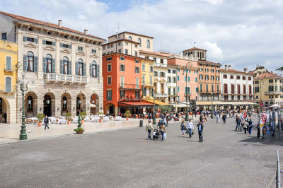 People walking on street in city