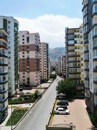 Buildings in city against sky