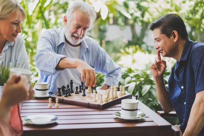 People relaxing on table