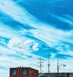 Low angle view of built structure against blue sky