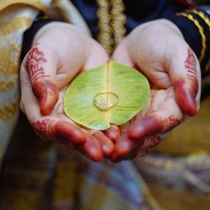 Close-up of woman hand holding heart shape